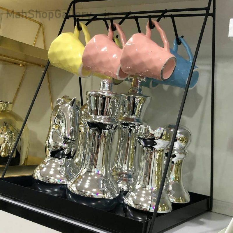 استند آویزدار مشکی و طلایی رنگ کوره ای